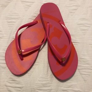 Tory Burch pink rubber flip flops